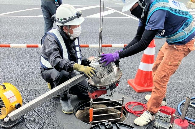 下水道マンホール浮上防止対策工事の画像